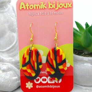 Handmade black, yellow, red and orange polymer clay earrings. Boucles d'oreilles